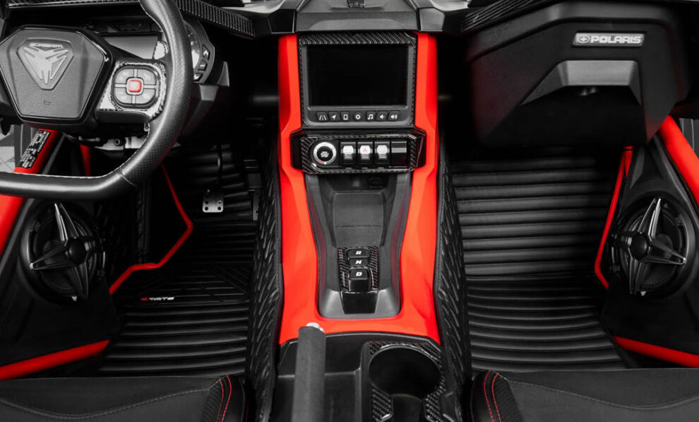 Custom-fit floor mat installed in a modern car footwell